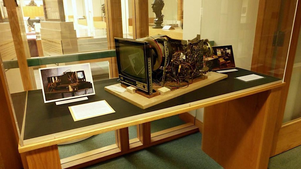 The Paik/Abe Raster Manipulation Unit, a modified television, in a display case